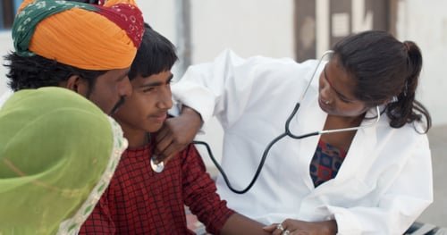 Healthcare professional engaging with members of a community